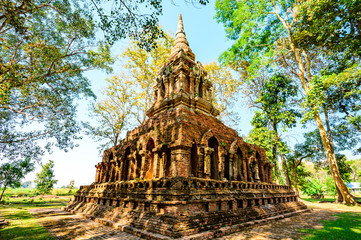 Old pagoda with teak trees in Pa Sak temple