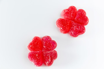 Two flowers made of red fruit jelly