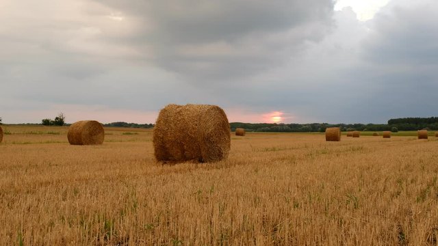 Hay bales in the sunset