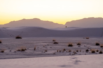 desert sunset with mountains in background
