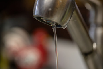 Water running slowly from faucet
