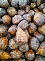 pile of tropical snake fruit salak from indonesia in the market