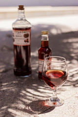 bottle and glass of beer on wooden table
