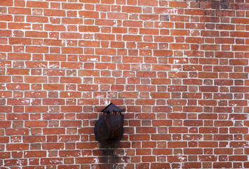 A fragment of an old brick wall