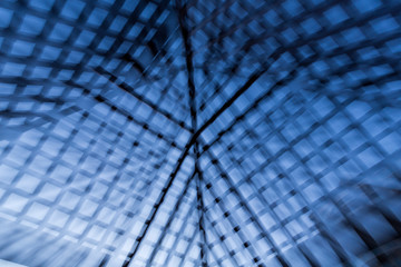 Fototapeta premium Abstract blue and black lines angles and shadows against the sky