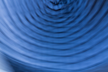 Abstract long exposure blue and black lines angles and shadows against the sky motion blur