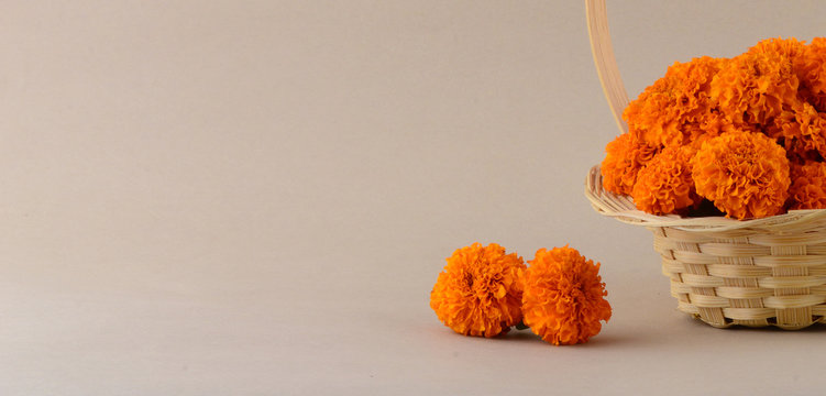 Marigold (Zendu Flowers) flowers in a bamboo basket.