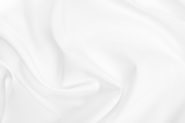 Obraz premium Abstract white fabric texture background. Cloth soft wave. Creases of satin, silk, and cotton. 