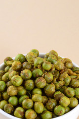 Spiced fried green peas {chatpata matar} Indian snack. Dried salted green peas