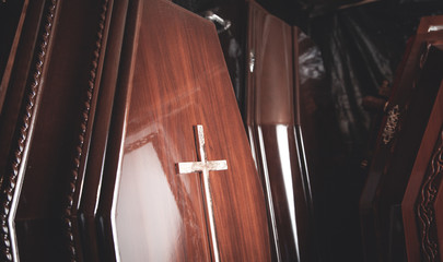 Wooden coffins in the dark room. - obrazy, fototapety, plakaty