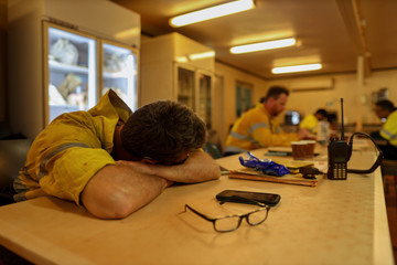 Construction miner having a break naps ,sleep during lunch time after working 12 HRS night shift in...