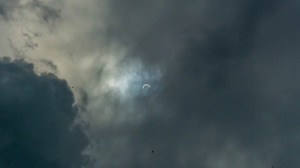 The annular "Ring of Fire" partial solar eclipse 2019 on the dark sky.