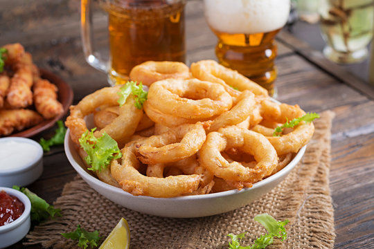 Onion Rings In Batter With Sauce And Cheese Sticks. Beer Snacks. Copy Space