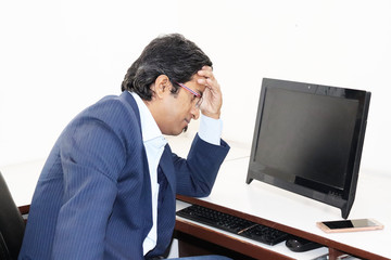 Young Man with computer and Mobile