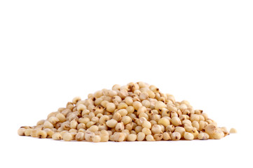 Heap of Jowar (Sorghum) on white background, Close up.