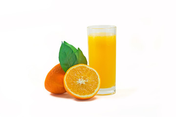 A cup of orange juice and cut orange on  white background.