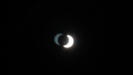 Rivervale Plaza 540118, Singapore - DECEMBER 26, 2019: Annular Ring of Fire Solar Eclipse 26 Dec 2019 Moon covering Sun covered with moon shadow