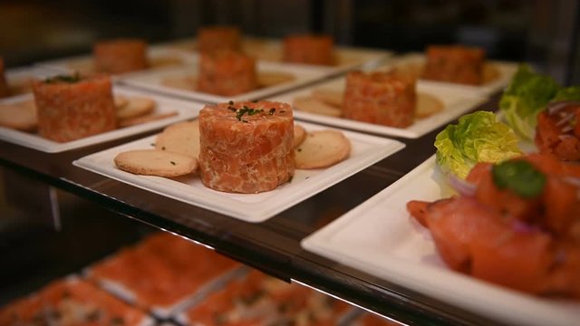 A wide variety of traditional tapas with seafood in Spain at the San Miguel market