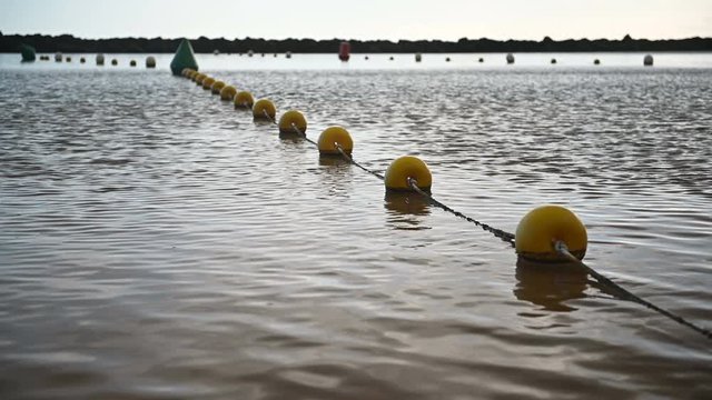 Long row of buoys on the coast of Tenerife