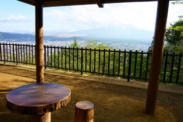 Hillside gazebo overlooking Fuji Yoshida City, with Mount Fuji itself visible in the distance