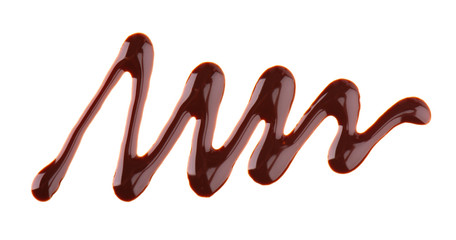 Chocolate syrup drizzle isolated on white background. Splashes of sweet chocolate sauce. Top view.