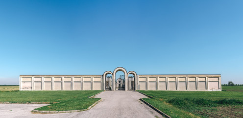 The entrance to the cemetery, Rationalist style building in Tresigallo, called "metaphysical city". Tresigallo, Ferrara, Emilia Romagna, Italy, Europe.