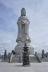 Fototapeta na wymiar Statue of Goddess Kwan Im 22.8 meter high statue was founded in Vihara Avalokitesvara in downtown Siantar, located in Jalan Siposo-Poso. 