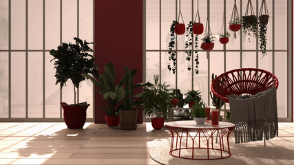 Modern conservatory, winter garden, white and red interior design, lounge with rattan armchair and table. Industrial romantic room, parquet floor. Relax space full of potted plants