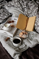 flat lay in scandinavian style. Coffee and breakfast in bed.