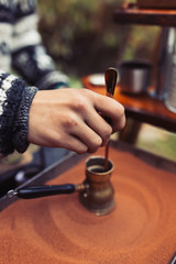 Turkish coffee preparation outdoors food market.