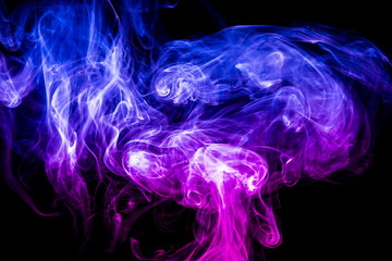 Colored smoke on black background