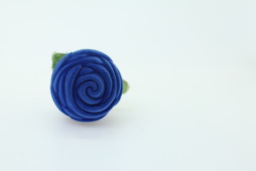 Blue rose setting on the white background for copy space photo
