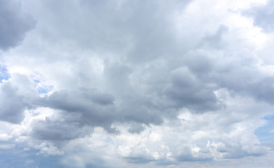 Fototapeta premium Beautiful white fluffy clouds formation on vivid blue sky know as raincloud