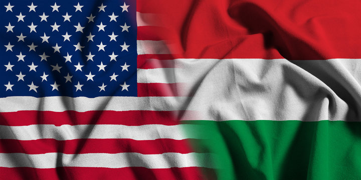 National flag of the United States with Hungary on a waving cotton texture background