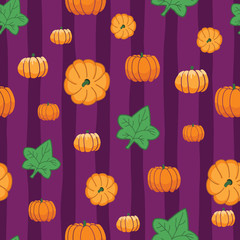 Seamless pumpkin pattern on purple stripes