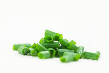 Green onion, green onion, green onion segments on a white background.