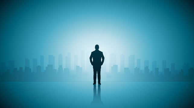 Silhouette business man standing on top of building looking at cityscape view on blue color background