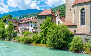 Fototapeta na wymiar Idyllic view in Chiusa on a summer morning, Province of Bolzano, Trentino Alto Adige, Italy.