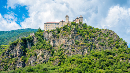 Fototapeta na wymiar Sabiona Monastery near Chiusa on a summer morning, Province of Bolzano, Trentino Alto Adige, Italy.