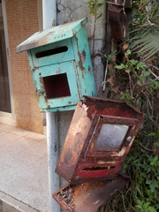 Old letter boxes on wall