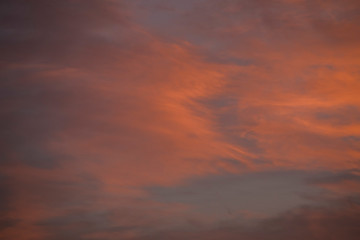 Texture of orange clouds at sunrise