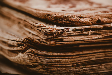 Fototapeta premium a ragged old rare book with many pages