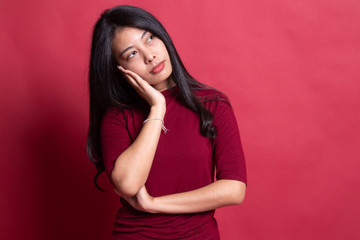 Beautiful young Asian woman get bored.