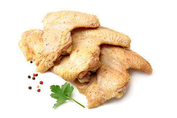 Raw chicken wings isolated on white background