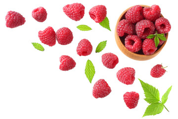 ripe raspberries with green leaf isolated on white background. top view