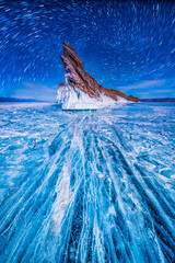 Tail of Ogoi island with natural breaking ice in frozen water at Lake Baikal, Siberia, Russia.