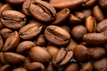 Coffee beans close-up background. Fresh roasted
