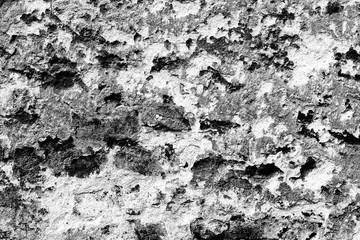 Texture of a brick wall with cracks and scratches which can be used as a background