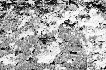 Texture of a brick wall with cracks and scratches which can be used as a background