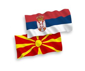 Flags of North Macedonia and Serbia on a white background